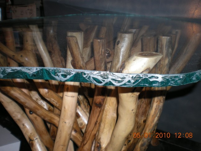 Amorphic cut glass on a stump table.